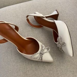 Amina Muaddi Style shoes.